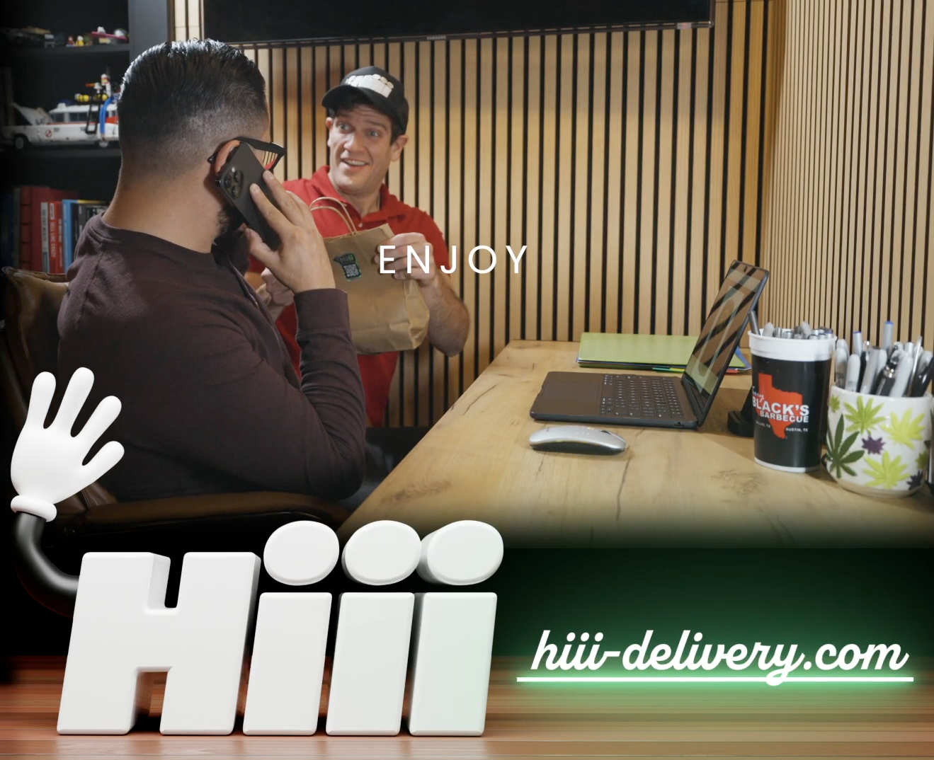 Cannabis delivery arriving at an Austin office from Hiii Delivery, customer receiving discreet paper bag while on a phone call
